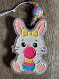 Easter Bunny blowing bubble