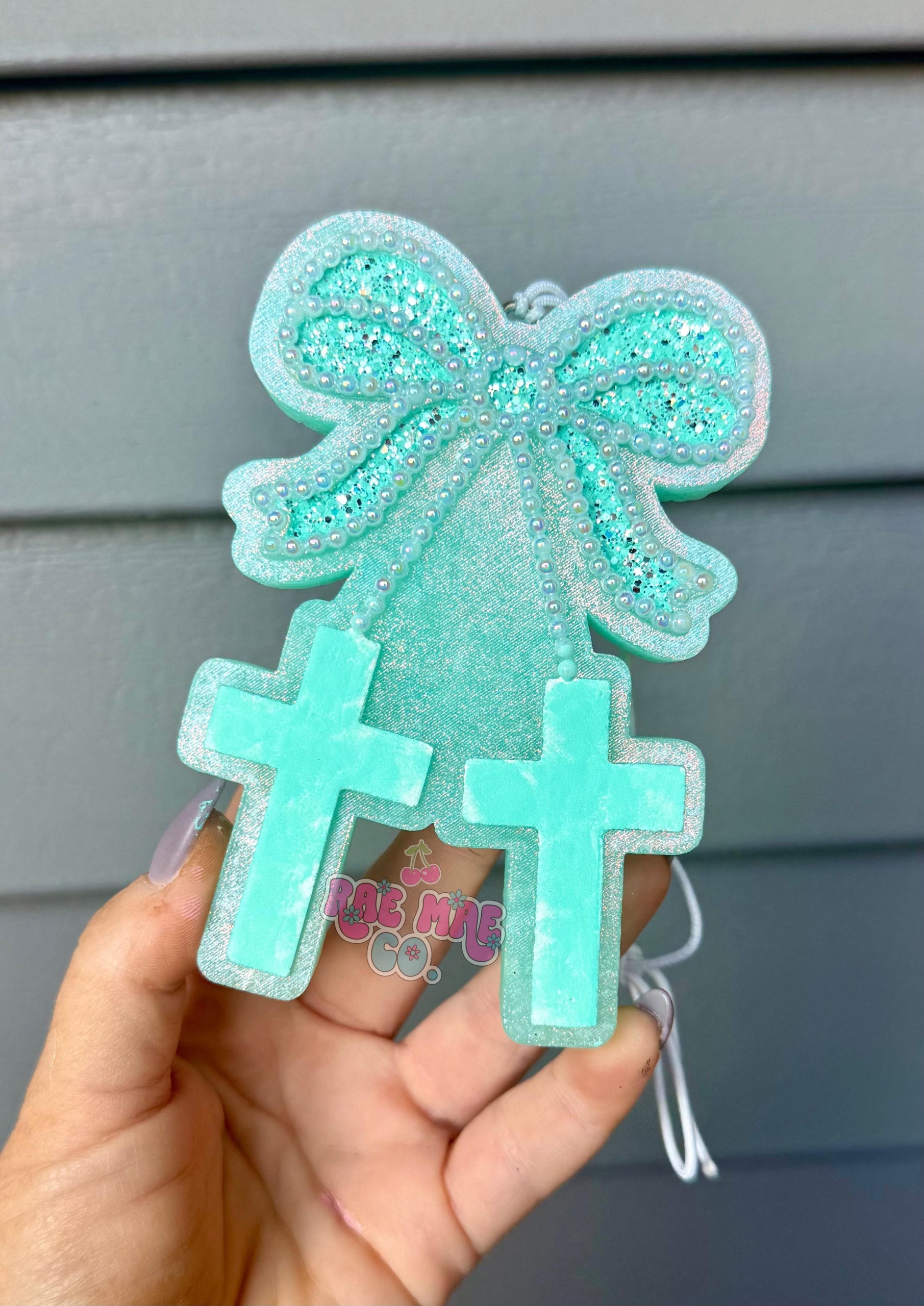 Cross Cherry with Bow