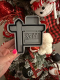 Sold sign